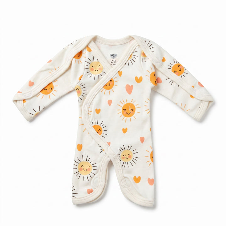 White preemie/NICU full body suit with smiling sun print, front view — White Sun Print