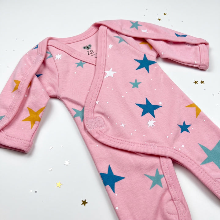 Pink preemie/NICU full body suit with star print, angled view — Pink Star Print