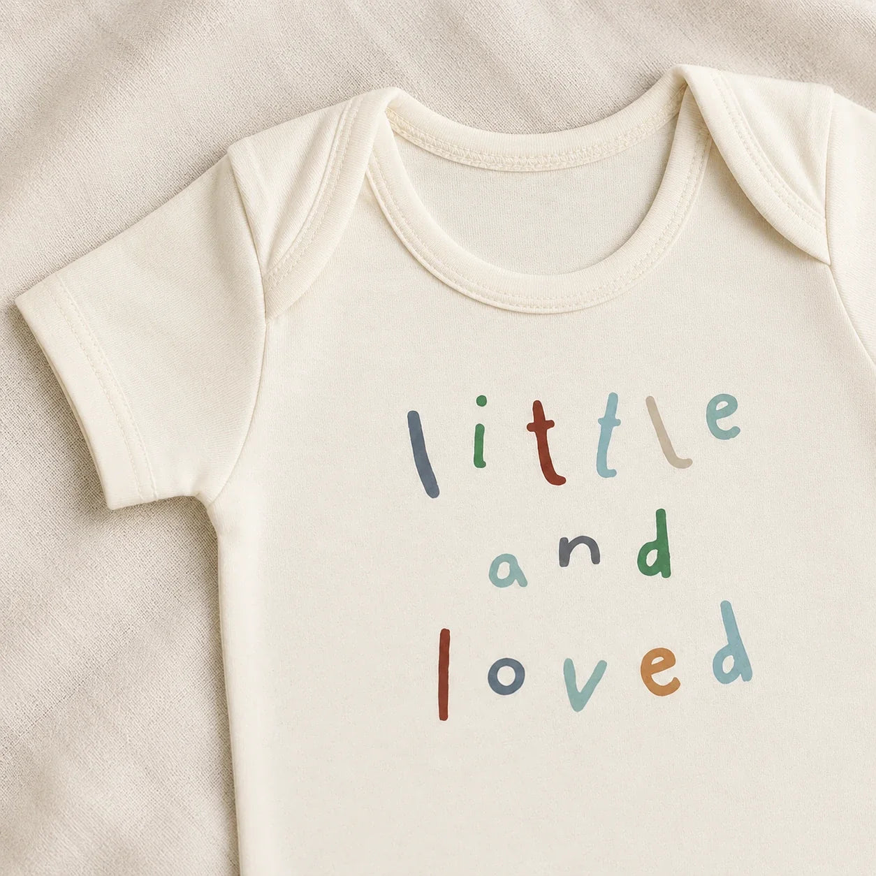 Little and Love | Baby Basic Bodysuit | print and neckline detail