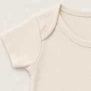 Off White | ZB Baby Basic Bodysuit – envelope shoulder detail warm