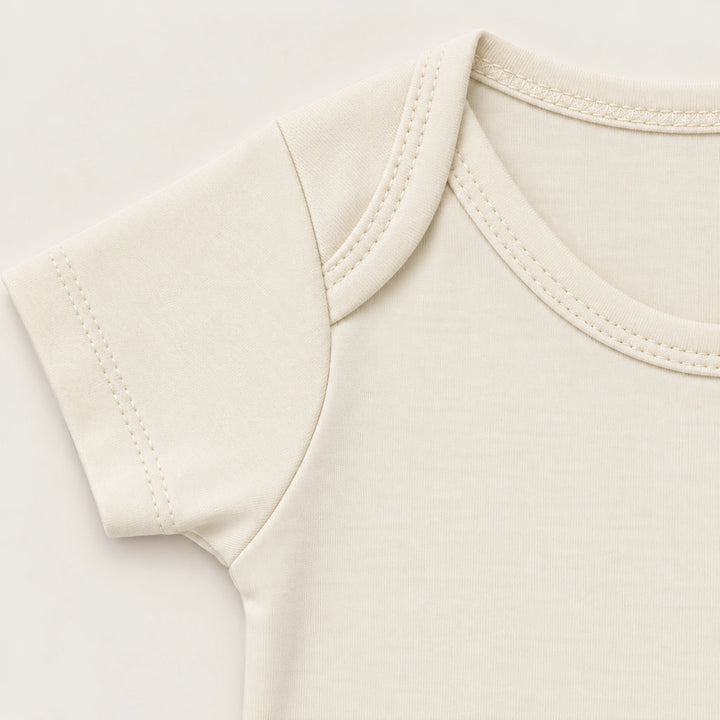 Off White | ZB Baby Basic Bodysuit – envelope shoulder detail warm