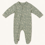 Little Dino | ZB green dinosaur-print footed zipper romper, front view on premium background