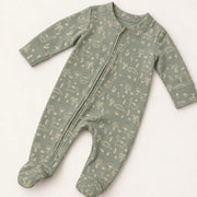 Little Dino | ZB green dinosaur-print footed zipper romper, angled view