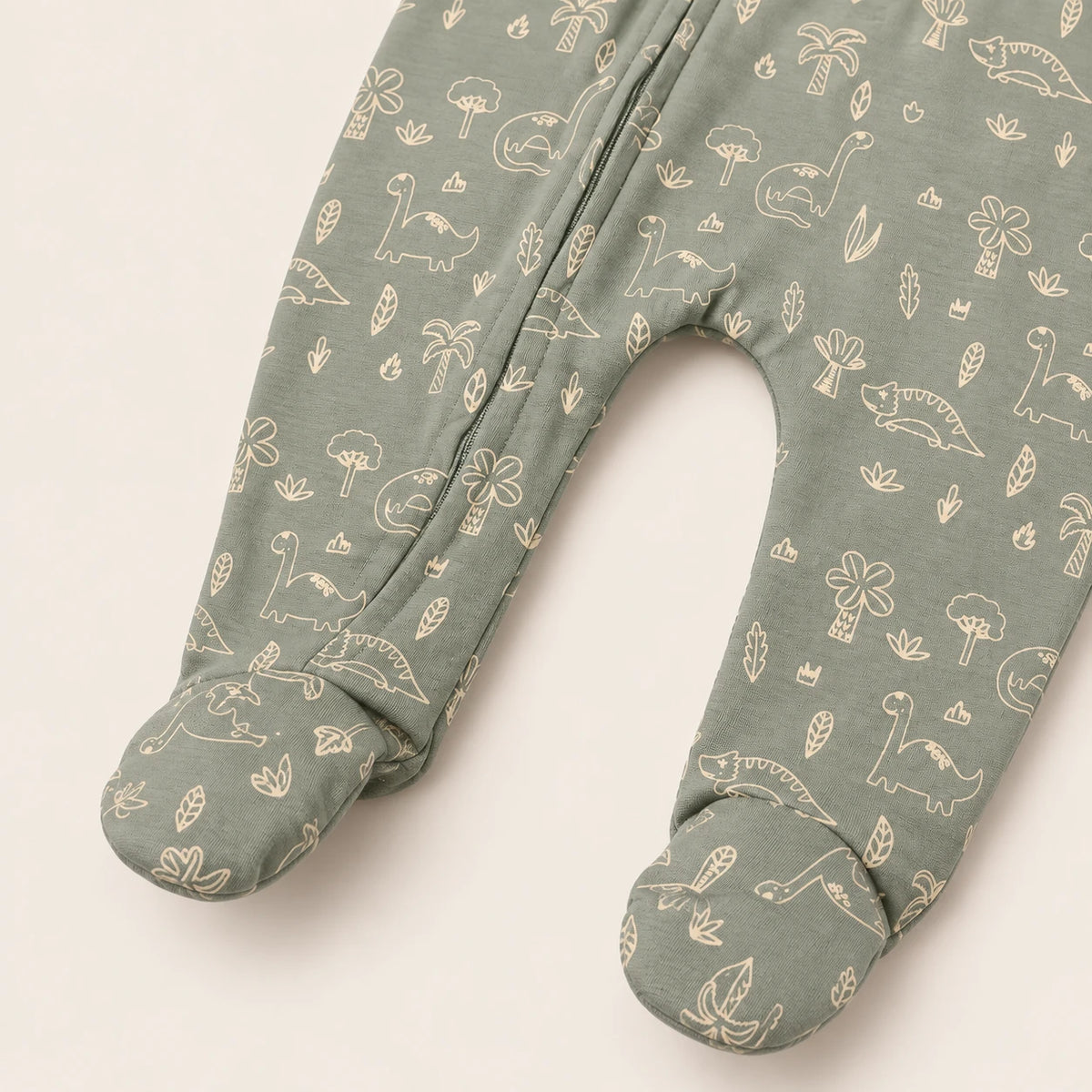 Little Dino | ZB green dinosaur-print footed zipper romper, enclosed feet detail