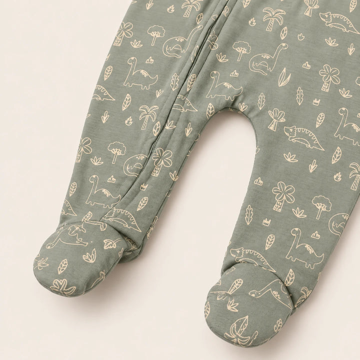 Little Dino | ZB green dinosaur-print footed zipper romper, enclosed feet detail