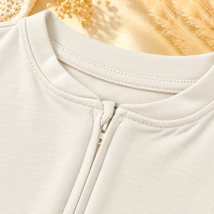 Off White | ZB Baby Romper Zipper – zipper neck detail angle luxury gold