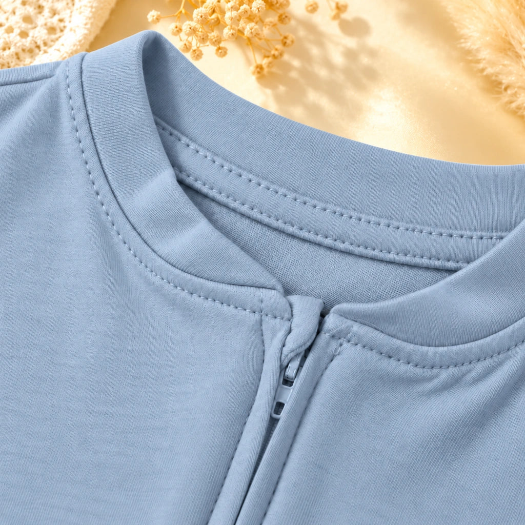 Summer Song | ZB Baby Romper Zipper – zipper neck detail angle luxury gold