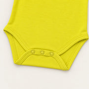 Lemon | ZB Sleeveless Lace Bodysuit – snap detail warm