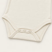 Off White | ZB Sleeveless Lace Bodysuit – snap detail warm