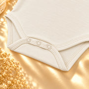Off White | ZB Sleeveless Lace Bodysuit – three snaps detail angle luxury gold